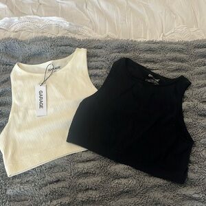 Garage black tank tops
